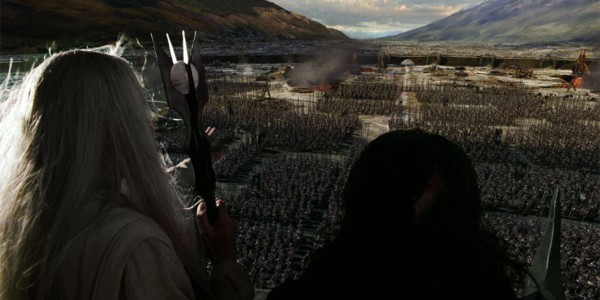 Saruman and Wormtongue look over their troops