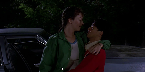 What is the meaning of In Sixteen Candles, the Asian character Long Duck  Dong is as an emasculated BUTT of the joke? - Question about English (US)